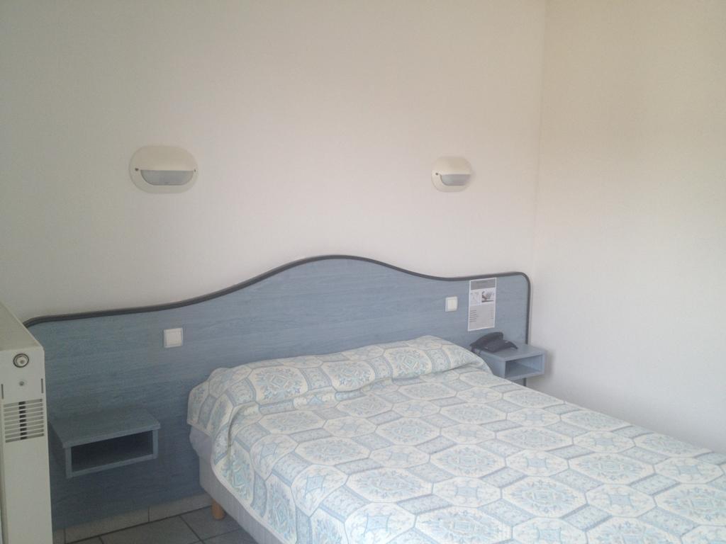 Hotel Le Strasbourg Mulhouse Rum bild